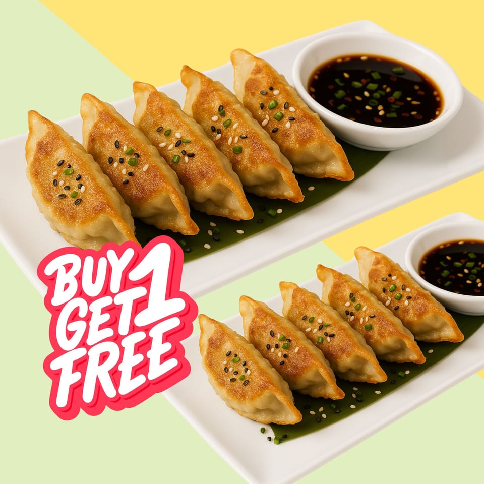 Two plates of golden-brown gyoza with dipping sauce, advertising a "Buy 1 Get 1 Free" offer.